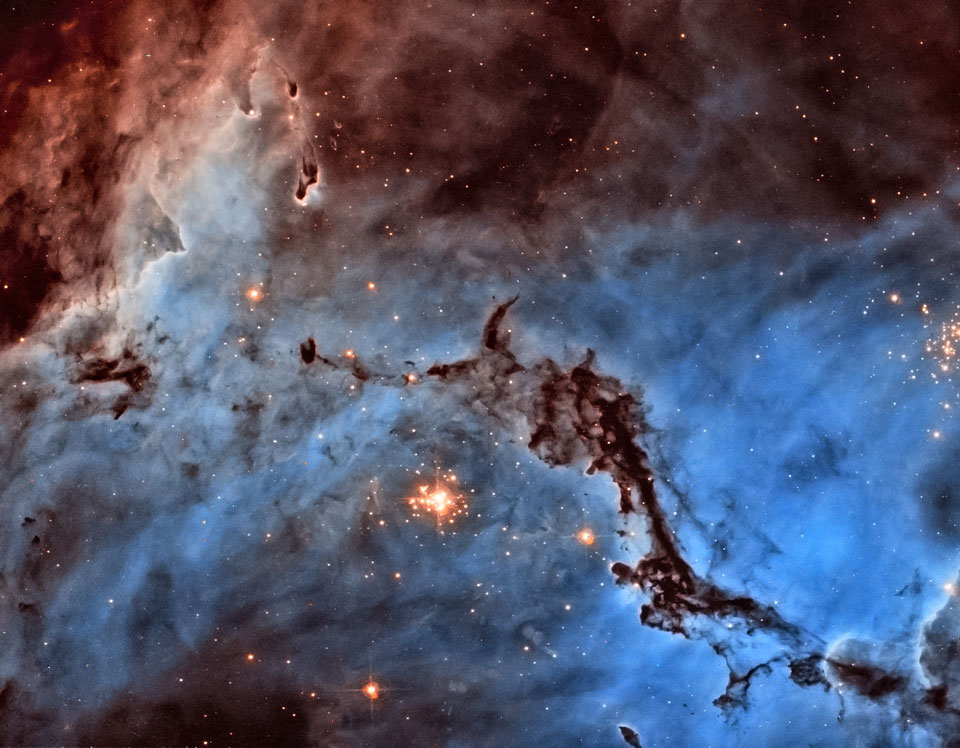 Opisywane zdjęcie pokazuje ciemną mgławicę N11
w Wielikim Obłoku Magellana -- galaktyce satelitarnej
Drogi Mlecznej. Zobacz opis. Po kliknięciu na obrazek załaduje się wersja
 o największej dostępnej rozdzielczości.