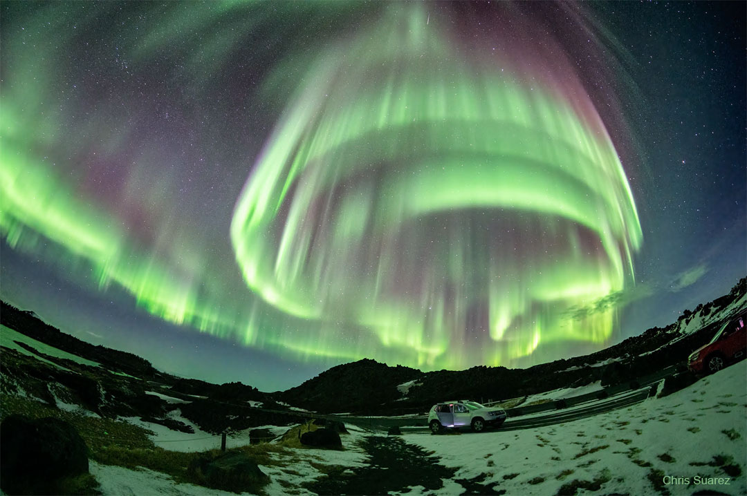 The featured image depicts a bright aurora that 
occurred over Iceland in March. The curvature of the
aurora makes it look like a vortex.
Please see the explanation for more detailed information.